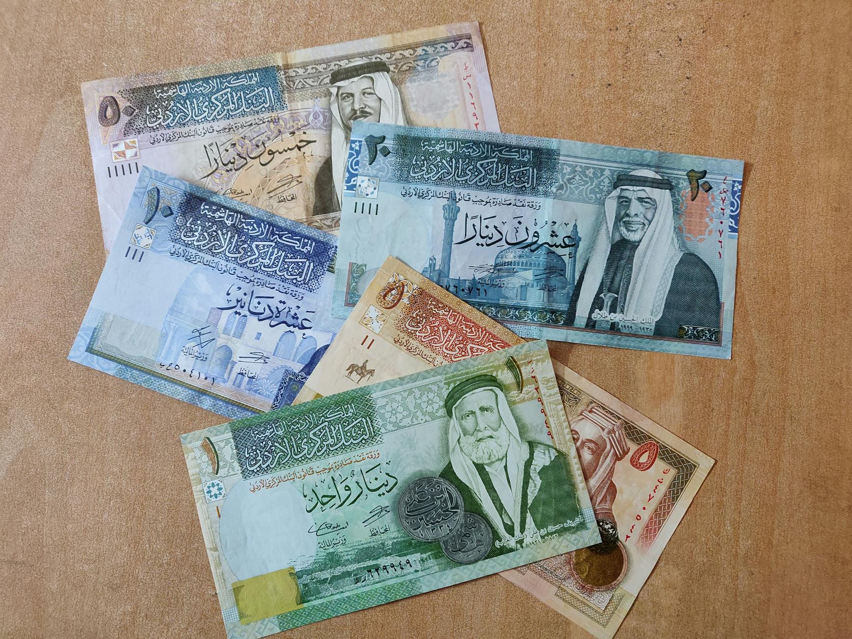 a close up shot of jordanian dinar bills